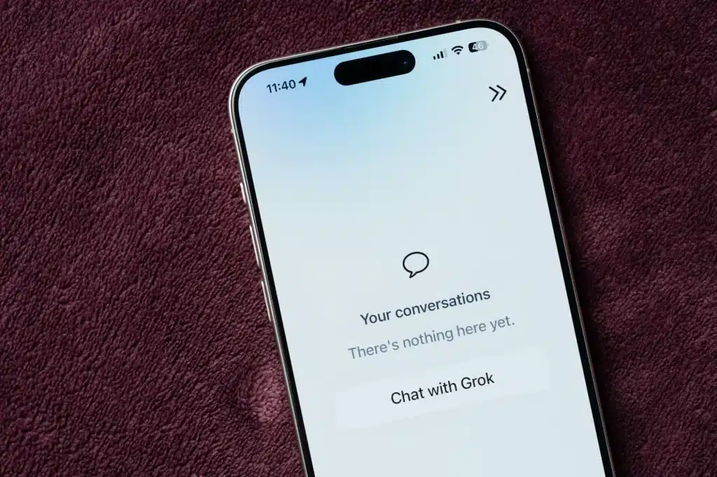 Smartphone screen showing empty conversation page on xAI Grok app