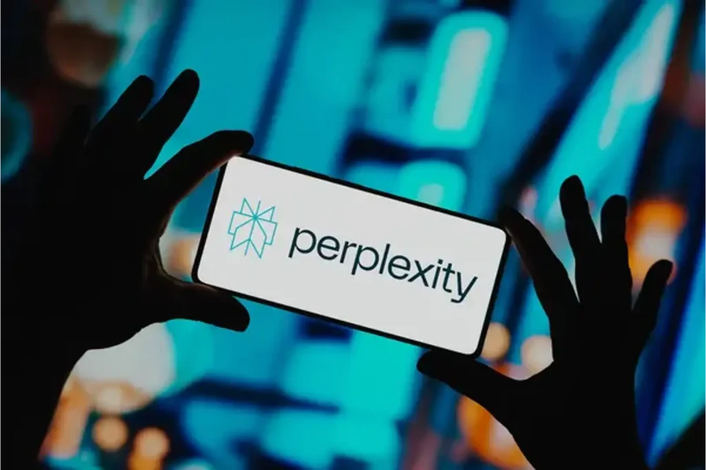 Perplexity Labs logo shown on smartphone held in hands against a blue city lights background.