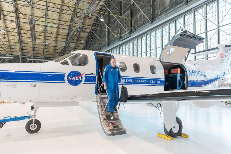 NASA Pilot Mark Russell emerges from NASA’s Pilatus PC-12 after mobile communication tests at NASA’s Glenn Research Center in Cleveland on April 17, 2025.