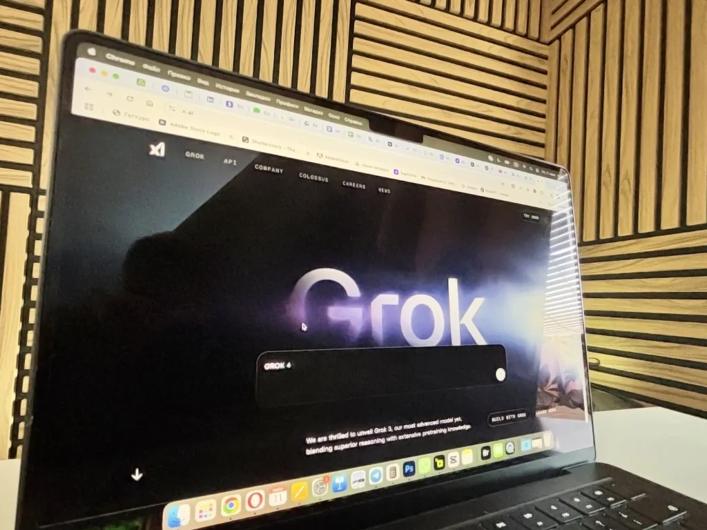 Grok AI Chats displayed on a MacBook screen in a modern workspace